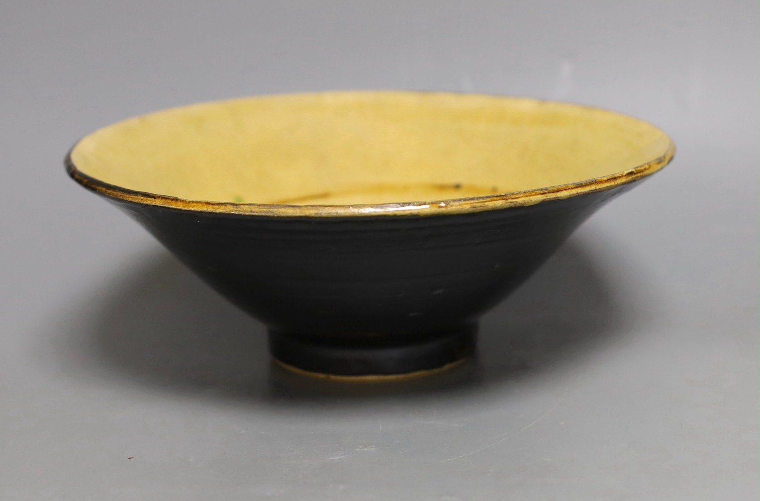 A large Chinese Jizhou type black bowl, 24.5cms diameter
